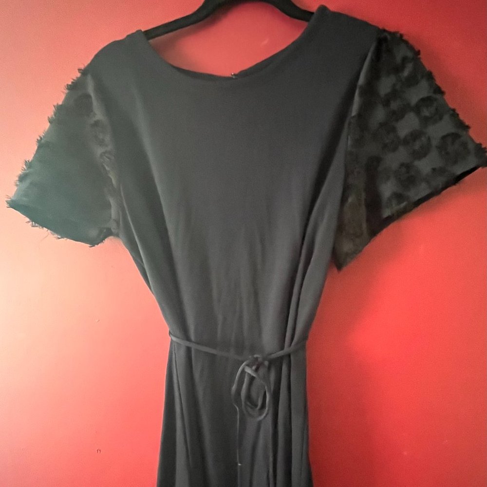 Loft: Jersey knit navy blue dress with flutter sleeve. Size M.